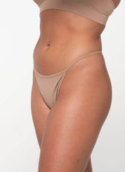 Natv Its a G ThangG StringnullIt’s a G Thang – Ultra-Soft, Minimal & Seamless
You asked, we listened—so here she is! Our one and only micro G-string, designed with our signature Lenzing TENC
