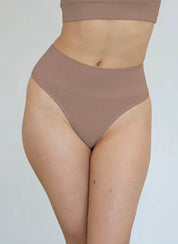 Nude high-waisted shapewear G-string for tummy control and seamless fit