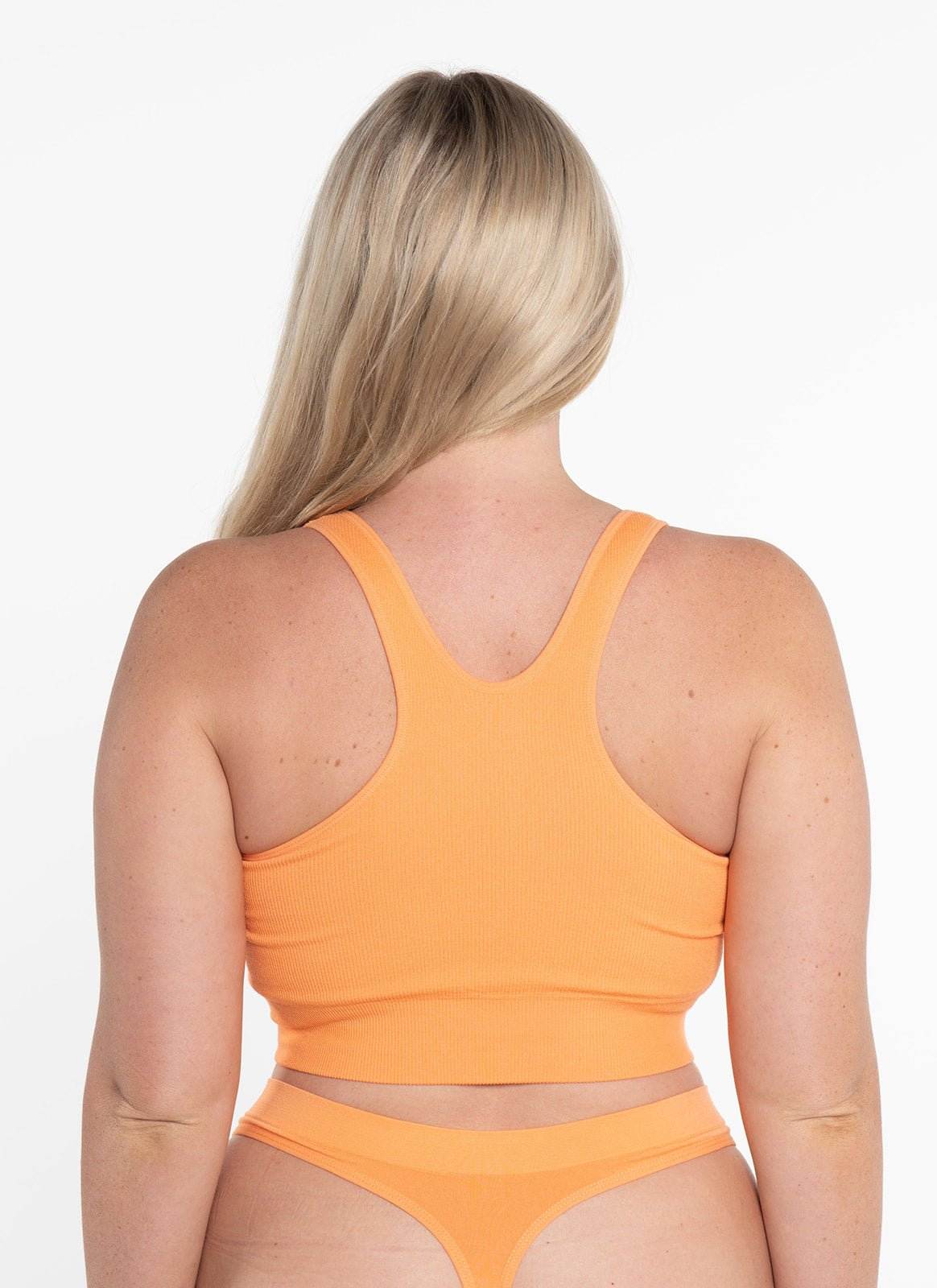 Racer Crop - SunsetCropnullSay hello to the ultimate mix of comfort and style—our Racer Back Luxe Crop, now in a vibrant Sunset. Whether you’re lounging on the couch or turning heads on the st