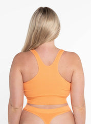 Racer Crop - SunsetCropnullSay hello to the ultimate mix of comfort and style—our Racer Back Luxe Crop, now in a vibrant Sunset. Whether you’re lounging on the couch or turning heads on the st