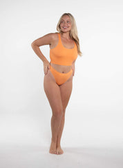 Racer Crop - SunsetCropnullSay hello to the ultimate mix of comfort and style—our Racer Back Luxe Crop, now in a vibrant Sunset. Whether you’re lounging on the couch or turning heads on the st