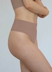 The ChiChi 7 G BundleSetsnullOur ChiChi G is a shape shifting, high waisted G String that will hold you tight in all the right places. 
High-waisted shape shifting G string
Thick, firm compress