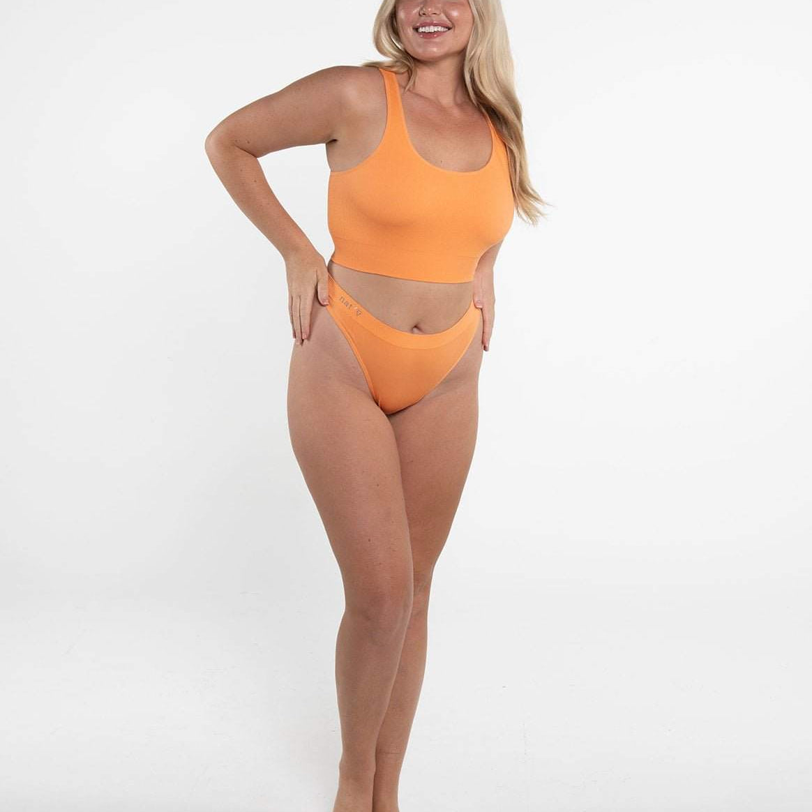 Racer Crop - SunsetCropnullSay hello to the ultimate mix of comfort and style—our Racer Back Luxe Crop, now in a vibrant Sunset. Whether you’re lounging on the couch or turning heads on the st