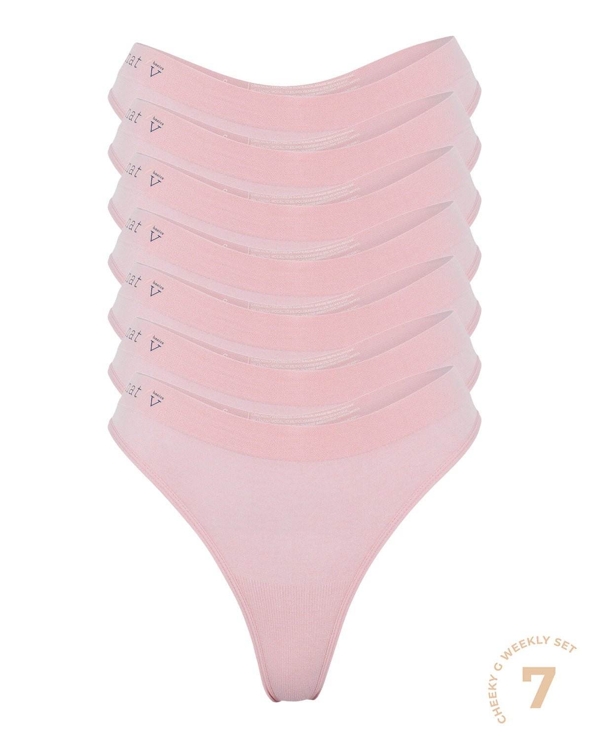 Stack of seven pink medium G string underwear with thin waistband and semi-seamless design, limited edition colors, comfy g string bundle